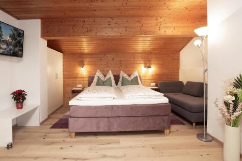 Postel nebo postele na pokoji v ubytování Appartementhaus Radstadt