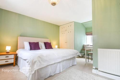 Ліжко або ліжка в номері Wedgwood Cottage, Cawsand