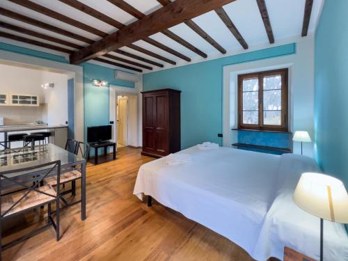 Postel nebo postele na pokoji v ubytování La Chiusa di Rio