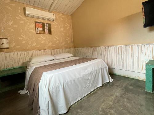 Katil atau katil-katil dalam bilik di Ranchos 30 Hotel Fazenda