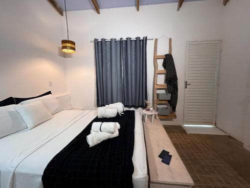 Katil atau katil-katil dalam bilik di Ranchos 30 Hotel Fazenda