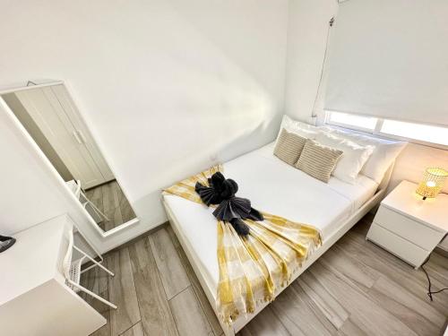 Postel nebo postele na pokoji v ubytování Mango Sorbet by Lovely Property