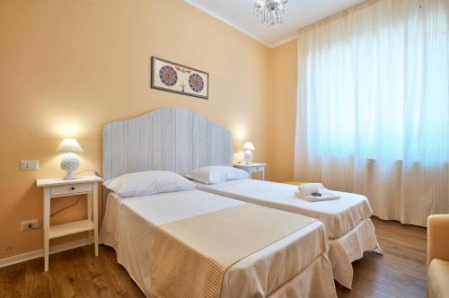 Postel nebo postele na pokoji v ubytování B&B Del Corso