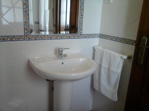 Et badeværelse på Residencial Idalio
