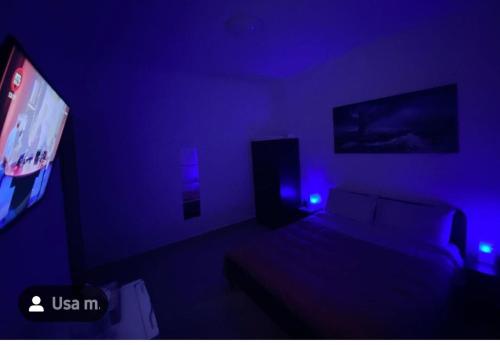 Een bed of bedden in een kamer bij MicamAle