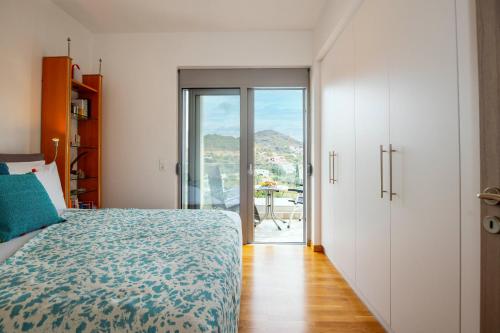 En eller flere senge i et værelse på Barbara Apartment