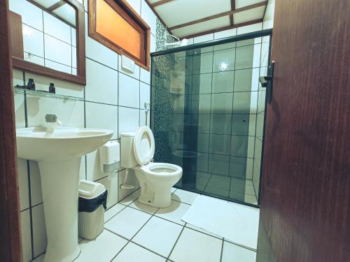 Koupelna v ubytování Pousada Igarakuê Flat
