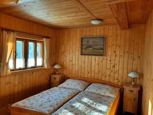 Cama ou camas em um quarto em Bouda Na Cestě