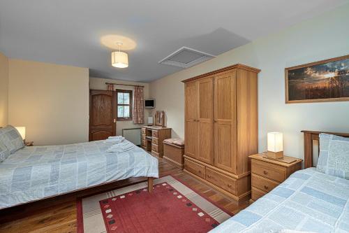 Postel nebo postele na pokoji v ubytování Finest Retreats - Eithinog