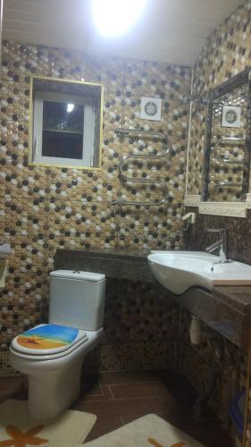 Ein Badezimmer in der Unterkunft Hotel Chateau