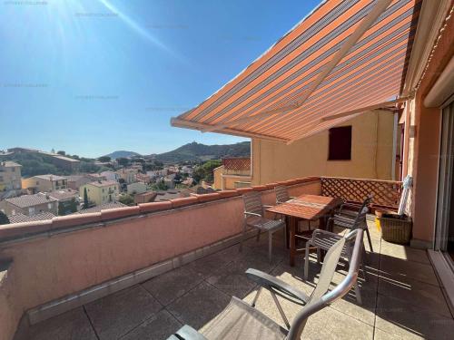 2RO601E Agréable T2 cabine avec grande terrasse parking privé vue dégagée