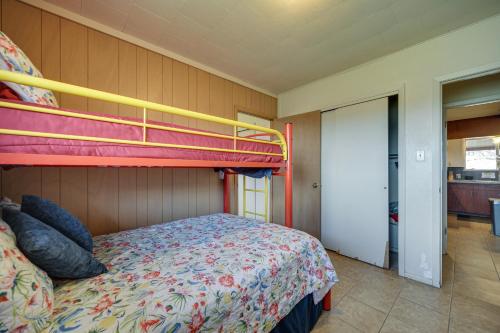 a bedroom with a bed with a bunk bed at Rustic and Western House on Lake - Swim and Fish! in Llano
