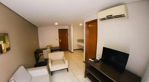 Televisyen dan/atau pusat hiburan di Happy Hotel Manaíra
