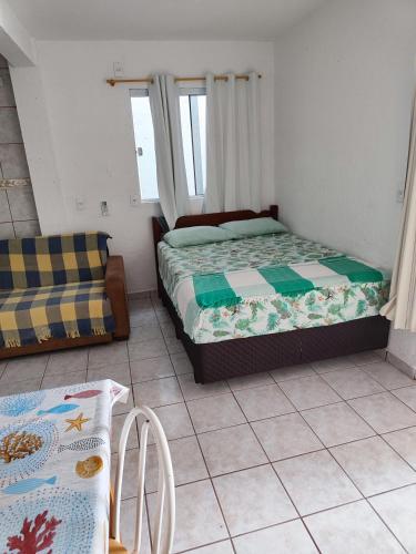 Кровать или кровати в номере Casas do juju