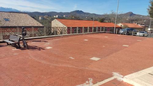 a basketball court with a bench in a parking lot at LaFuntanella45 Casa Vacanze in Isernia