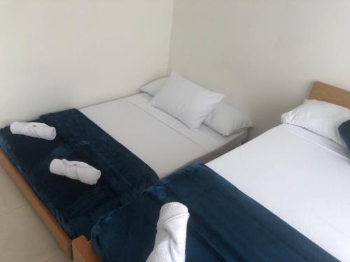 Ein Bett oder Betten in einem Zimmer der Unterkunft Rosa de Cafeto