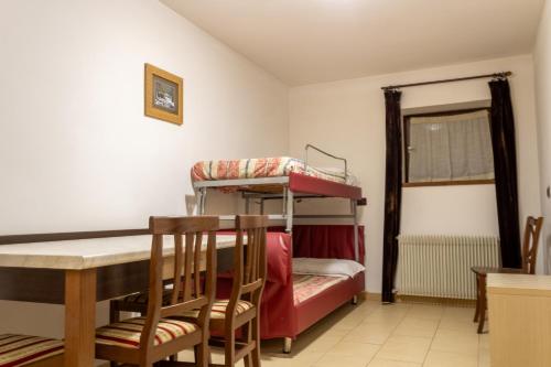 Ένα ή περισσότερα κρεβάτια σε δωμάτιο στο Hotel Zodiaco & Spa