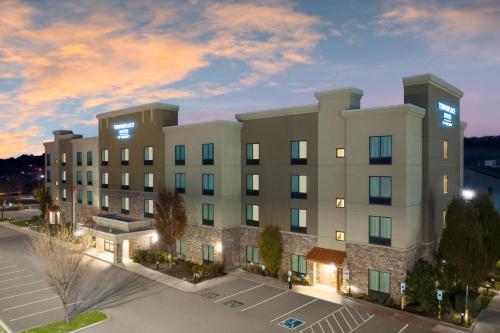 an exterior view of a hotel at dusk at TownePlace Suites by Marriott Nashville Smyrna in Smyrna