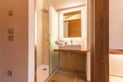 a bathroom with a sink and a mirror at Borgo Vinceri in Lucera