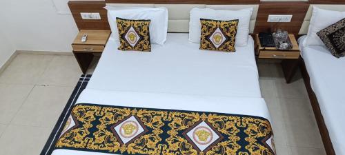 Una cama o camas en una habitación de Hotel Marina