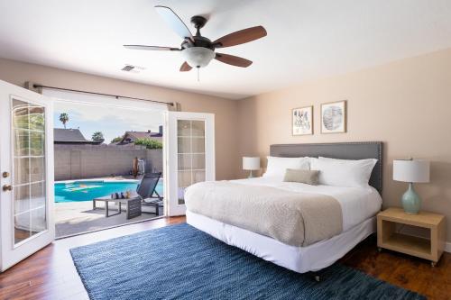 a bedroom with a bed and a ceiling fan at West Ridge by AvantStay A Place Of Comfort Perfect Sunsets by the Pool ❤ in Scottsdale