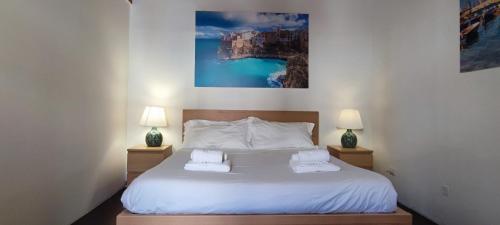 A bed or beds in a room at Liberty Futura Home