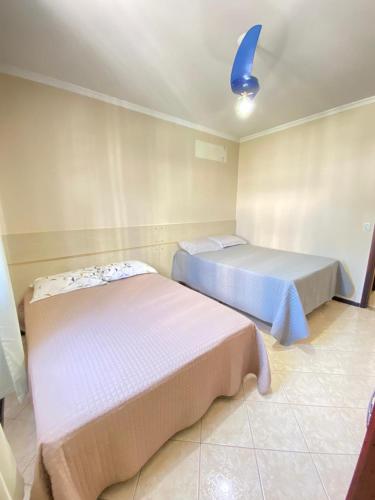Ένα ή περισσότερα κρεβάτια σε δωμάτιο στο Excelente Apartamento Centro Balneário Camboriú