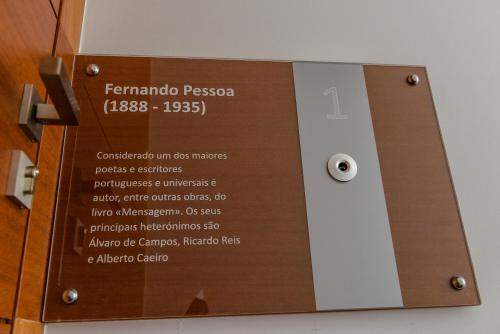a wooden door with a sign on it at Monte Do Malhao - Art, Eco & Spa in Castro Marim
