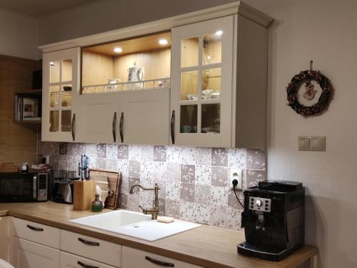 Kuchyň nebo kuchyňský kout v ubytování Slnečný dom