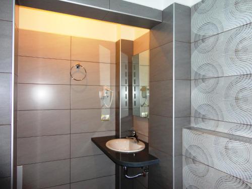 Koupelna v ubytování Hotel Kalemi 2