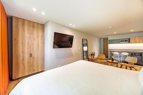 Katil atau katil-katil dalam bilik di The Somos Flats Central Poblado