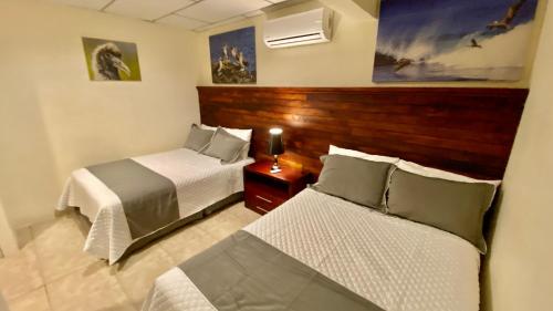 Letto o letti in una camera di Torre Mar Galapagos Boutique Suites