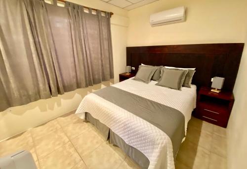 Letto o letti in una camera di Torre Mar Galapagos Boutique Suites