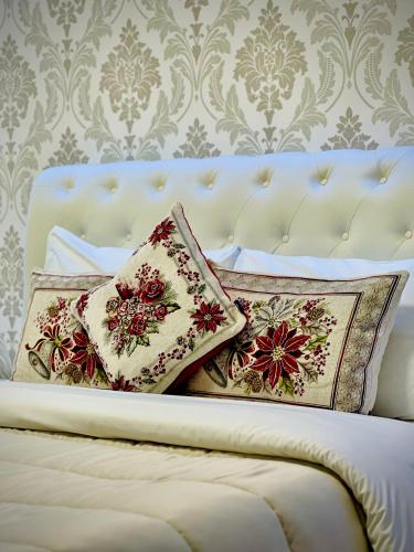 a white bed with two pillows on it at Blue Deluxe Venice in Mestre