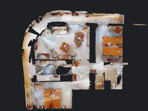 une vue sur un mur à certaines résitures dans l'établissement Agréable 3P à Menton avec Balcon, Parking Privé et Proche Plages - FR-1-196-347, à Menton