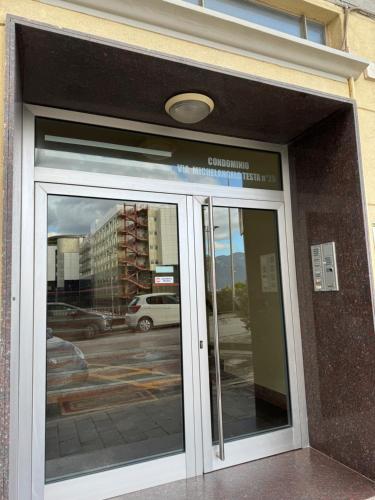 an entrance to a building with a revolving door at STELLA MARIUS in Salerno
