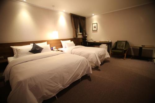 Krevet ili kreveti u jedinici u objektu Vatica Hotel Dongdaemun