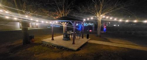 a park at night with trees and lights at Inn of the Dove - Romantic Luxury Suites with Jacuzzi & Seasonal Fireplace at Harrisburg-Hershey-Philadelphia, PA in Harrisburg