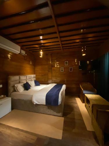 Ένα ή περισσότερα κρεβάτια σε δωμάτιο στο Lemonwood cottage