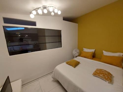 Un pat sau paturi într-o cameră la Villa olympique stade de France