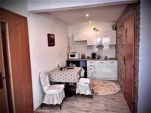 Kuchyň nebo kuchyňský kout v ubytování Homestay Renata