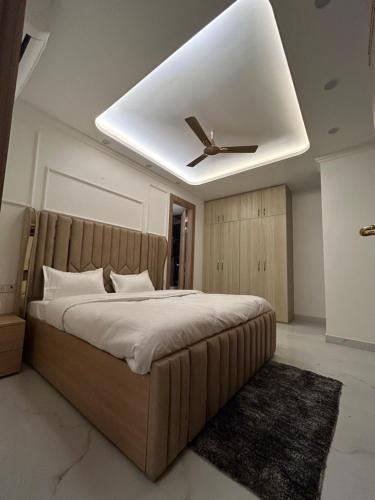 Tempat tidur dalam kamar di Anandam Managed By Beliv