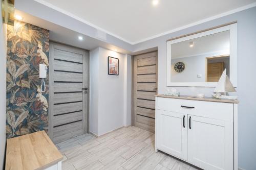 Kuchyňa alebo kuchynka v ubytovaní Apartamenty Jelitkowska 13,Gdańsk Jelitkowo, 100m od morza