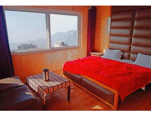 Katil atau katil-katil dalam bilik di Hotel Walnut Grove, Mussoorie