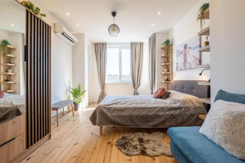 Postel nebo postele na pokoji v ubytování Bright Apartments – 2 Bedroom