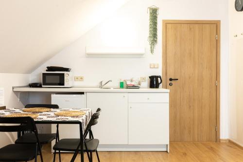 Η κουζίνα ή μικρή κουζίνα στο Molonówka Guest House