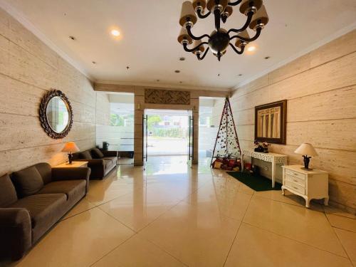 Χώρος καθιστικού στο Superior Room At Galeri Ciumbuleuit 1st Tower with Best View
