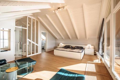 En eller flere senge i et værelse på Villa "Schleirose"