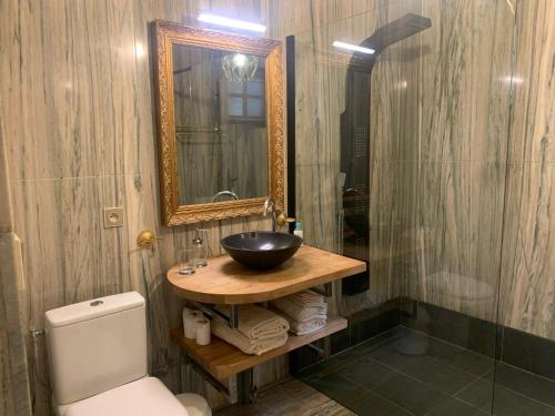 Koupelna v ubytování logement avec accès piscine