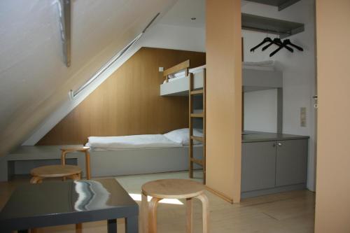 Postel nebo postele na pokoji v ubytování Storchencamp Gästehaus Purbach